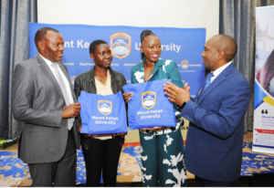 Popular Kenyan entrepreneur and entertainer Esther Akoth, popular as Akothee with MKU student Milly Nafula after granting her Sh50,000 towards her upkeep.Image: HANDOUT